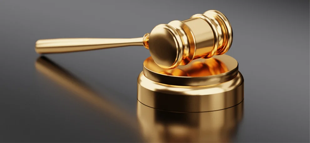 Canva-Golden-Hammer-and-Gavel