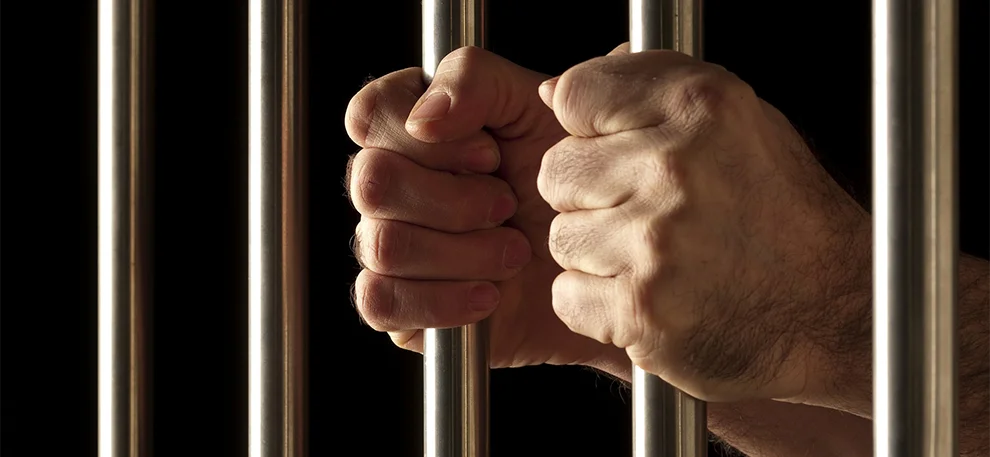 locked-up-behind-bars